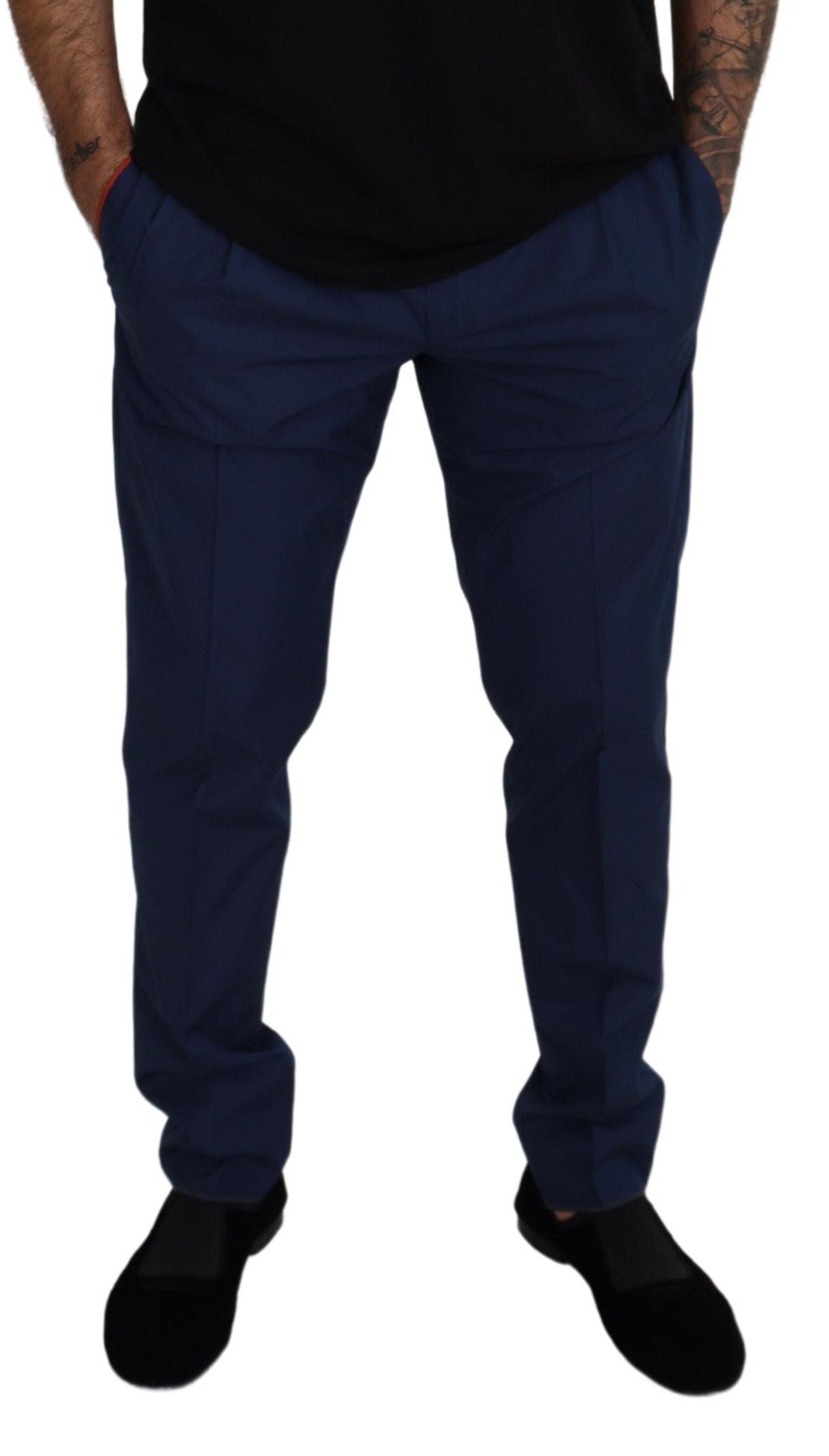 Trousers by Dolce & Gabbana for men in blue presents a perennial silhouette, meticulously tailored with a slim cut, long finish, and an elegant .