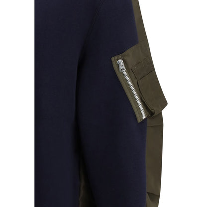 Activewear Sweatshirt by Sacai for men in nylon cotton blue presents a dynamic silhouette, featuring a dynamic and detailed with functional .