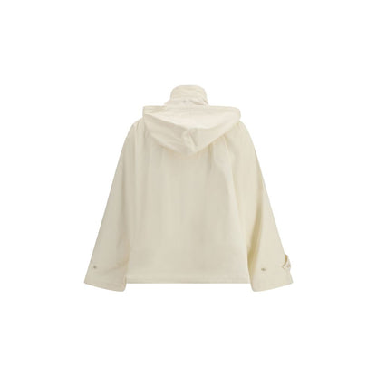 Overcoat by Fabiana Filippi for women in polyamide cotton cream showcases a enveloping silhouette, detailed with distinctive water-resistant, pockets & hooded and a enveloping hooded high-collar neckline.