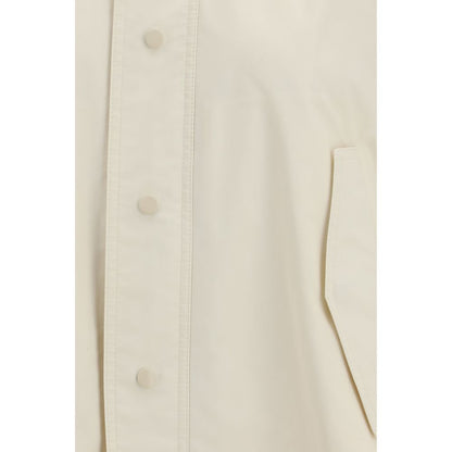 Overcoat by Fabiana Filippi for women in polyamide cotton cream showcases a architectural silhouette, artfully detailed with a distinctive and functional water-resistant, pockets & hooded for a architectural finish.