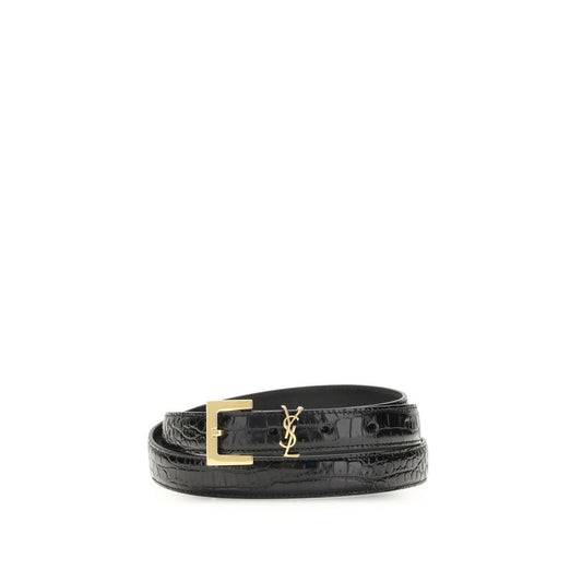 Belt by Saint Laurent for women in bos taurus crocodile embossed calf leather black presents a artisanal silhouette from the Cassandre Bos Taurus Crocodile Embossed Calf Leather Belt collection, showcasing an artisanal design and refined craftsmanship for a artisanal look.