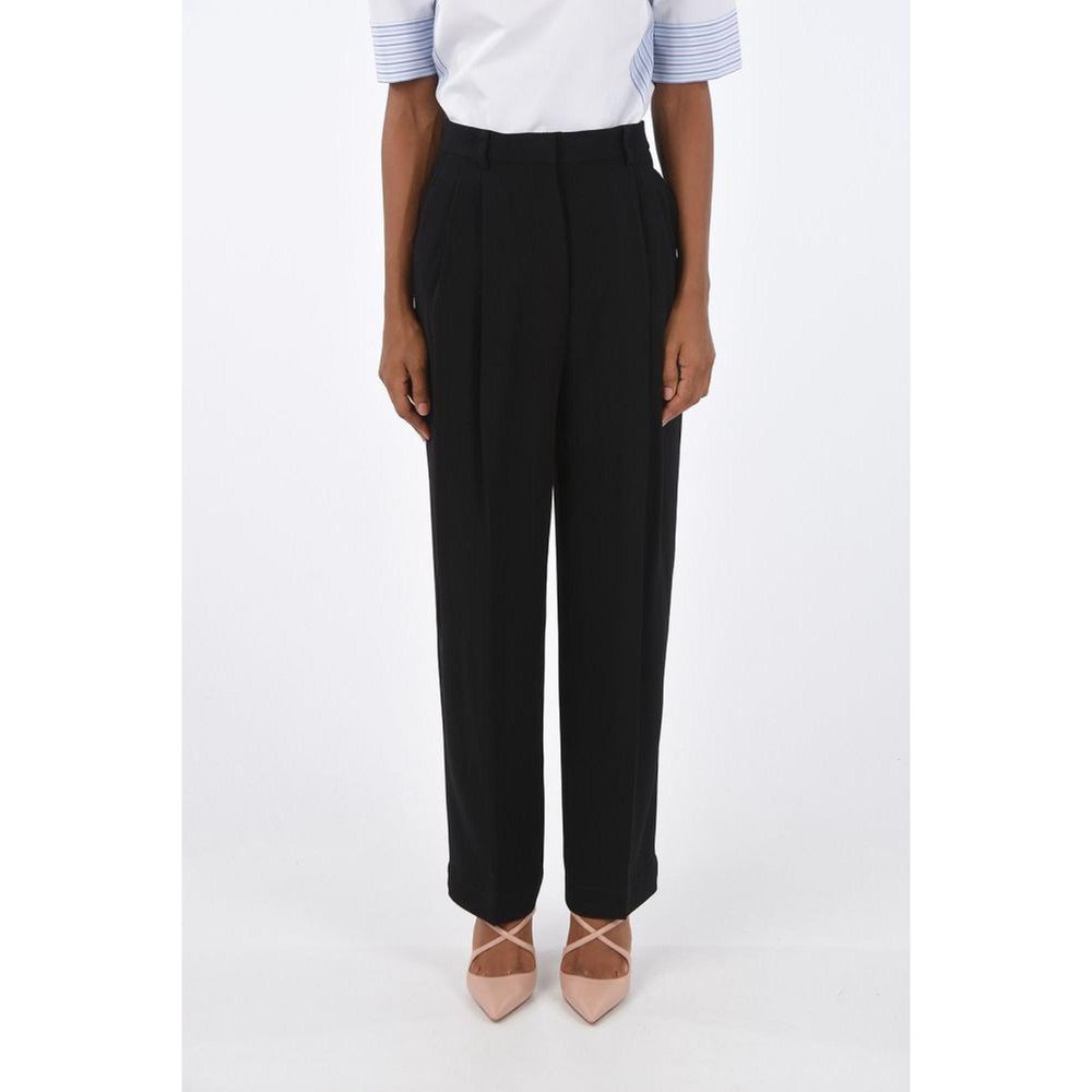Casual Pants by Tory Burch for women in acetate black presents a refined pantology silhouette, artfully defined by a refined pantology , long, and a sophisticated high rise.
