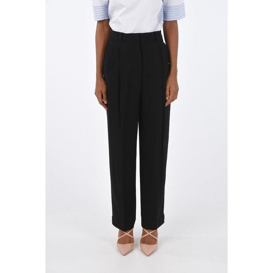 Casual Pants by Tory Burch for women in acetate black presents a refined pantology silhouette, artfully defined by a refined pantology , long, and a sophisticated high rise.