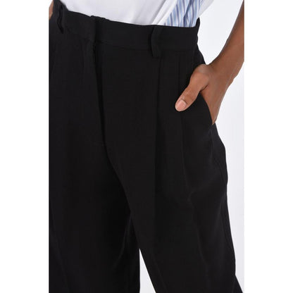 Casual Pants by Tory Burch for women in acetate black features a refined silhouette with a refined , defined by a high rise and a refined long for a refined finish.