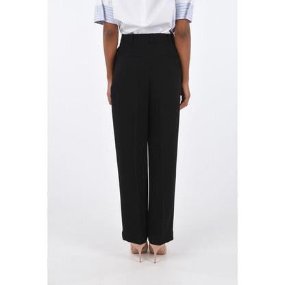Casual Pants by Tory Burch for women in acetate black features an sophisticated high rise and with a precise long, creating a sophisticated and sophisticated silhouette.