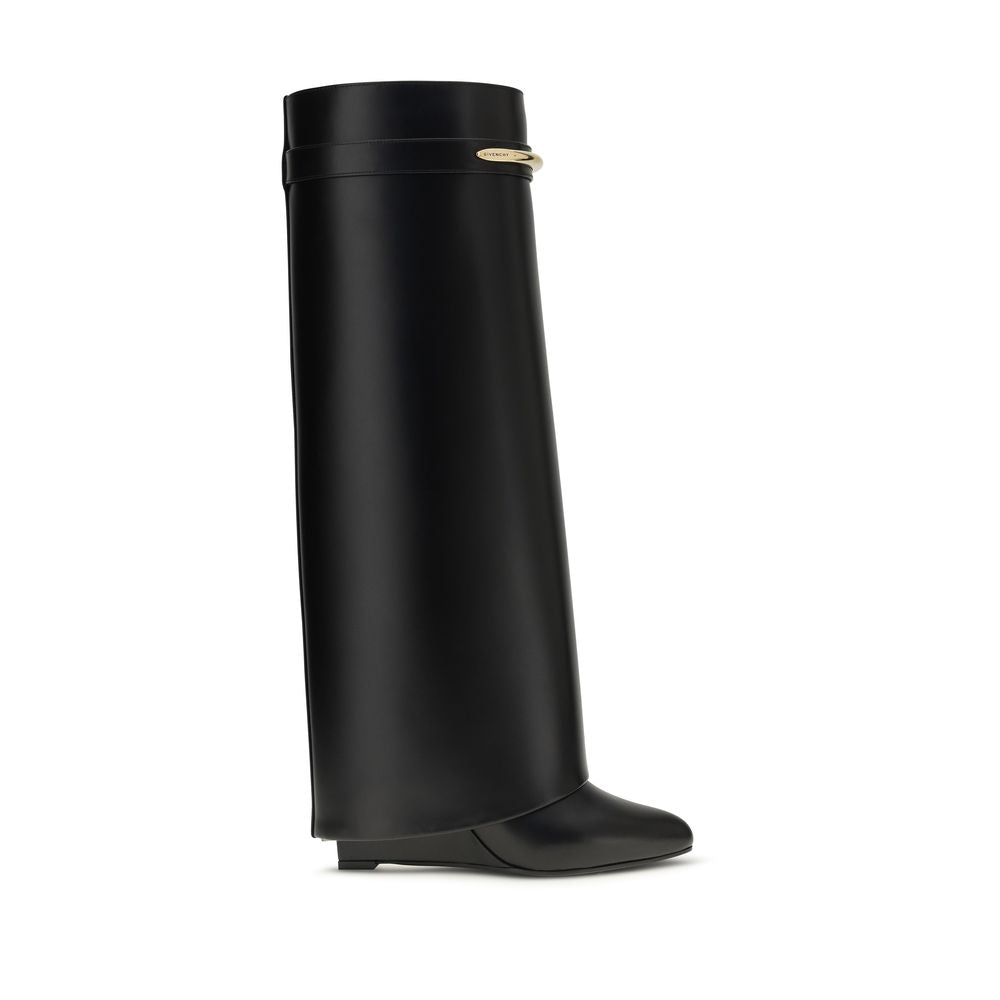 Wedge Boots by Givenchy for women in bos taurus calf leather black & gold features an dynamic silhouette, showcasing the dynamic Women's Bos Taurus Calf Leather Wedge Boots design with its distinctive wedge and elegant pointed toe style.