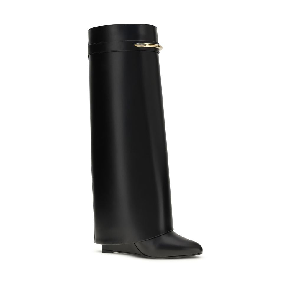 Wedge Boots by Givenchy for women in bos taurus calf leather black & gold features an effortless chic silhouette from the Women's Bos Taurus Calf Leather Wedge Boots collection, showcasing a effortless chic wedge and refined pointed toe style for an effortless chic look.
