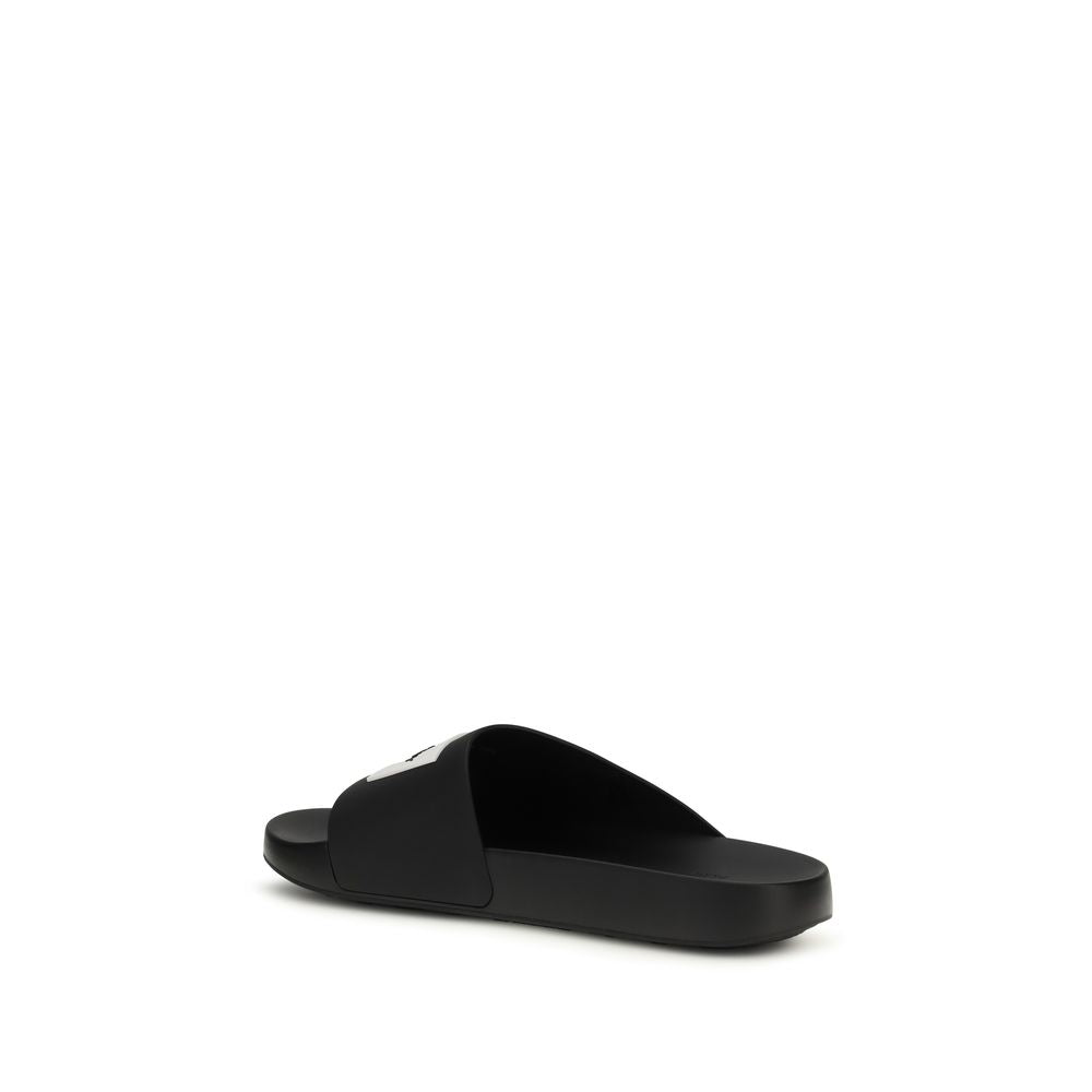 Flat Mule Slider Slippers by Givenchy for men in rubber black & signature presents a effortless silhouette, showcasing the elegant Men's Rubber Flat Mule Slider Slippers design with its unique flat and sophisticated .