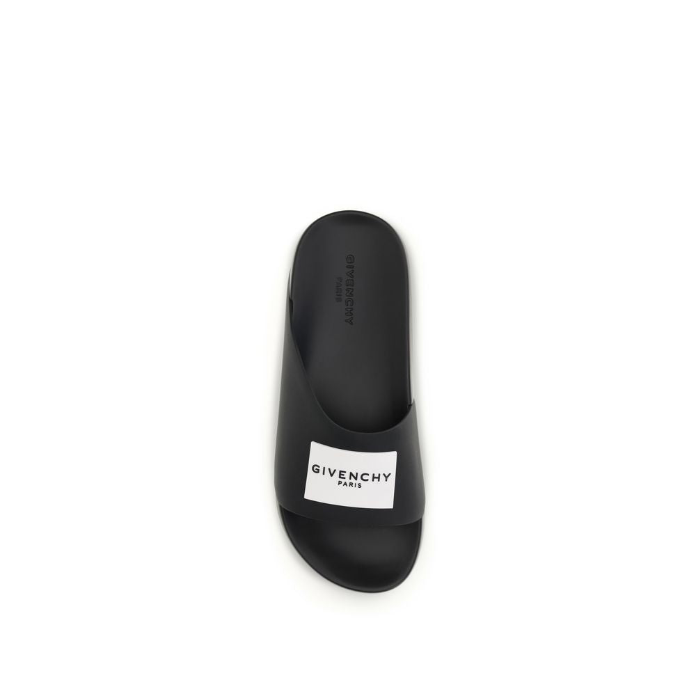 Flat Mule Slider Slippers by Givenchy for men in rubber black & signature features an effortless chic silhouette from the Men's Rubber Flat Mule Slider Slippers collection, showcasing a flat and effortless chic .