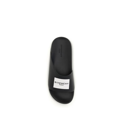 Flat Mule Slider Slippers by Givenchy for men in rubber black & signature features an effortless chic silhouette from the Men's Rubber Flat Mule Slider Slippers collection, showcasing a flat and effortless chic .