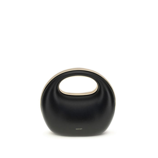 Handbag by Sacai for women in bos taurus calf leather black & gold features an refined silhouette, showcasing a secure snap, ample , and versatile handle for a sophisticated refined aesthetic.