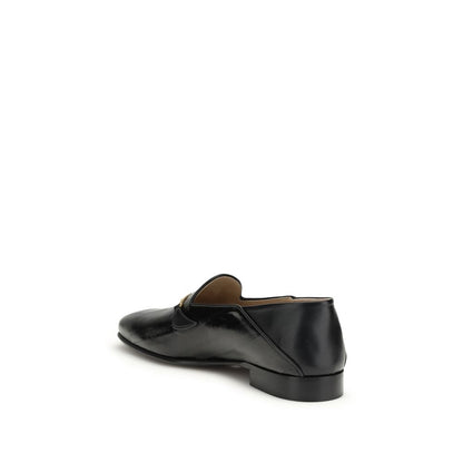 Loafer Slip-On Shoes by Valentino Garavani for men in nappa calf & eel leather black & signature features an effortless chic silhouette, showcasing the V Logo Men's Nappa Calf & Eel Leather Loafer Slip-On Shoes design with an effortless chic and a for a effortless chic look.