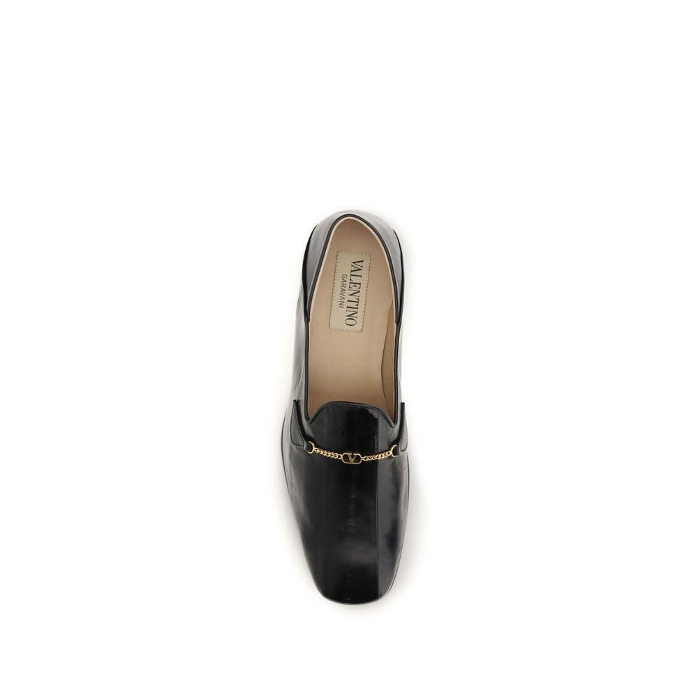 Loafer Slip-On Shoes by Valentino Garavani for men in nappa calf & eel leather black & signature showcases a timeless silhouette from the V Logo Men's Nappa Calf & Eel Leather Loafer Slip-On Shoes collection, featuring a timeless and for a timeless finish.