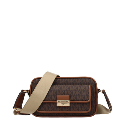 Crossbody Handbag by Michael Kors for women in fabric brown features a versatile chic silhouette, meticulously detailed with a secure , ample , and versatile crossbody-strap & adjustable-strap.
