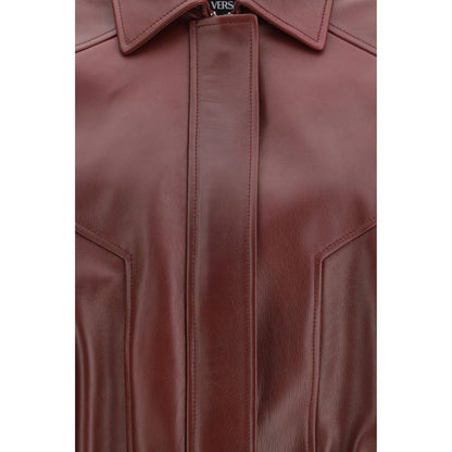 Jacket by Versace for women in bos taurus calf leather bordeaux showcases a enveloping silhouette, artfully detailed with a enveloping and premium pockets for a truly enveloping finish.