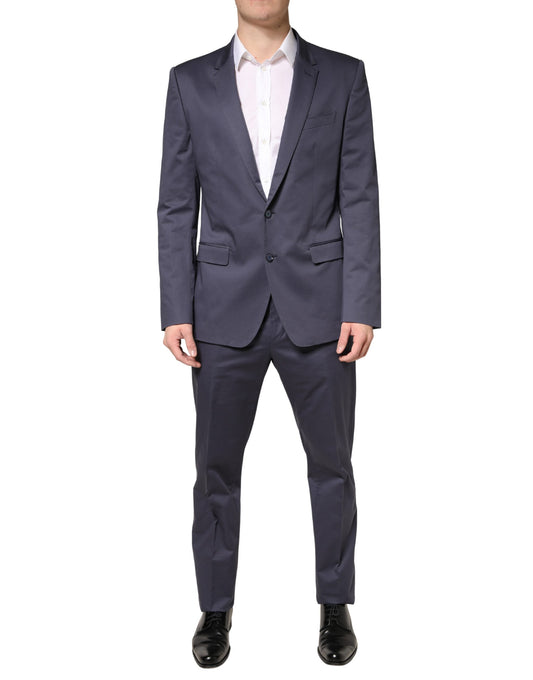 Pant Suit by Dolce & Gabbana for men in cotton viscose & cupro blue presents a sharp silhouette, artfully finished with a sharp single-breasted neckline and a sophisticated slim for a truly sharp look.