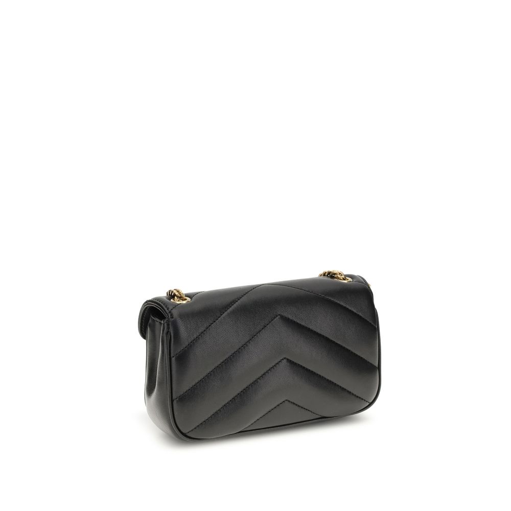 Quilted Shoulder Flap Bag by Saint Laurent for women in lambskin leather black & signature presents a versatile silhouette, showcasing a secure flap & magnetic and versatile single-compartment with versatile shoulder-strap & handle for a sophisticated look.