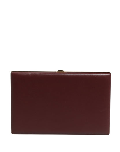 Evening Clutch Handbag by Dolce & Gabbana for women in calfskin leather black, brown & gold features a sculptural silhouette with a secure , organized , and versatile for a sculptural finish.