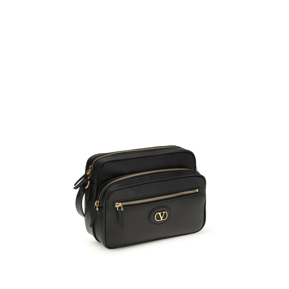 2-in-1 Shoulder & Crossbody Bag by Valentino Garavani for men in bos taurus calf leather black features an effortlessly chic silhouette with a secure , ample , and versatile crossbody-strap, shoulder-strap & adjustable-strap for effortlessly chic everyday luxury.