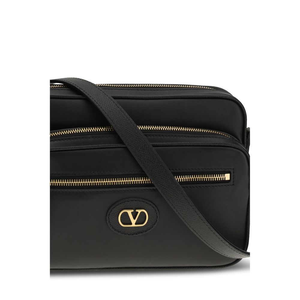 2-in-1 Shoulder & Crossbody Bag by Valentino Garavani for men in bos taurus calf leather black features a effortless chic silhouette with a secure , ample , and versatile crossbody-strap, shoulder-strap & adjustable-strap for a effortless chic finish.