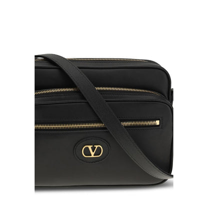 2-in-1 Shoulder & Crossbody Bag by Valentino Garavani for men in bos taurus calf leather black features a effortless chic silhouette with a secure , ample , and versatile crossbody-strap, shoulder-strap & adjustable-strap for a effortless chic finish.