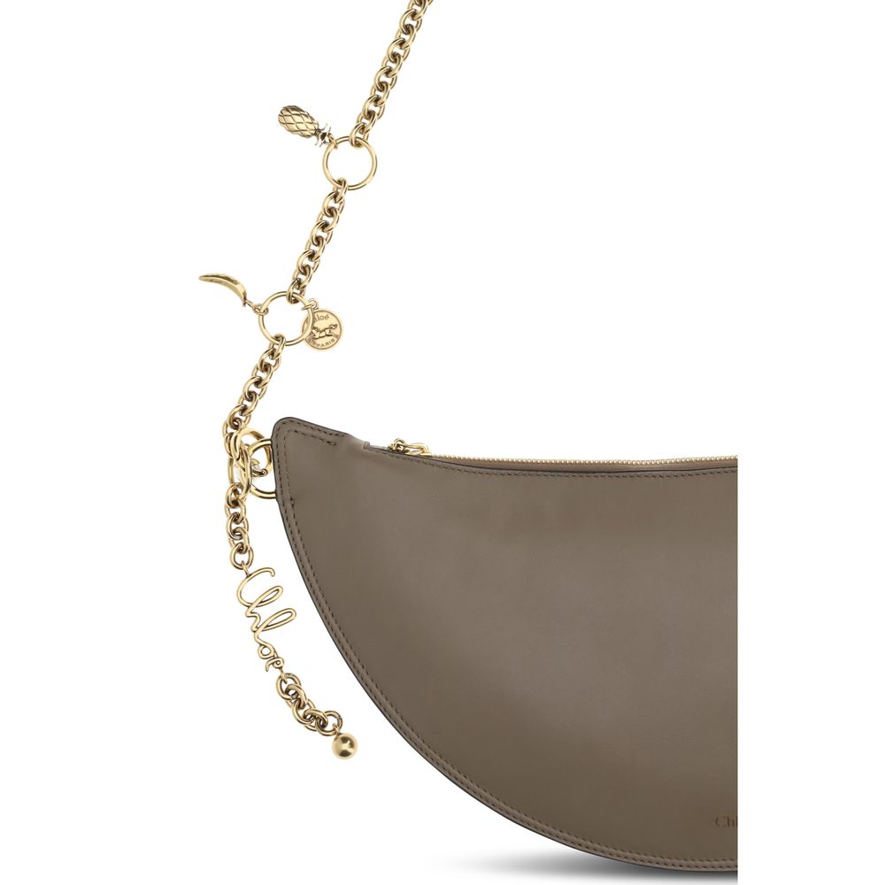 Shoulder Evening Clutch Bag by Chloé for women in bos taurus nappa leather gray features an effortlessly chic silhouette with a secure , ample , and versatile shoulder-strap & detachable-strap for effortlessly chic everyday luxury.