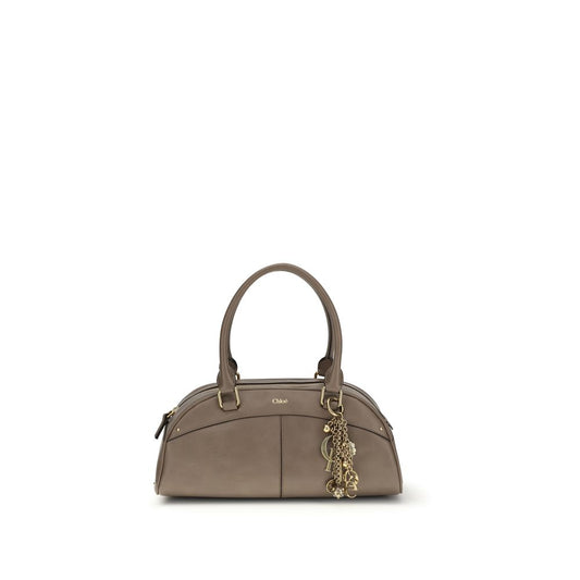 Large Bowling Handbag by Chloé for women in bos taurus calfskin leather gray presents a ornamental silhouette, showcasing a secure zipper, ample , and versatile handle for a ornamental finish.