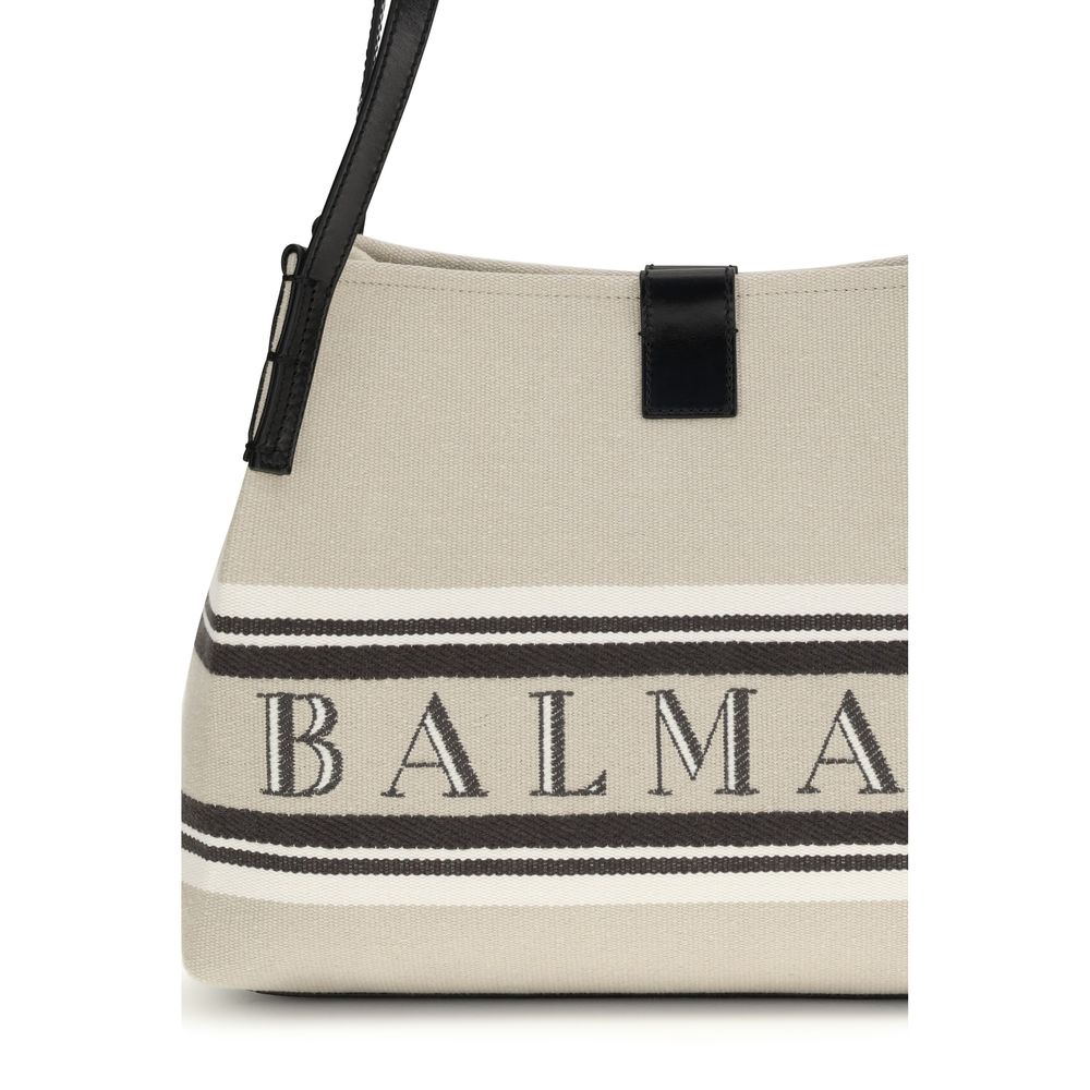 Shoulder Bag by Balmain for women in cotton polyester canvas beige, jacquard & signature features a distinguished silhouette, showcasing a secure magnetic and distinguished with versatile shoulder-strap & handle for a distinguished finish.