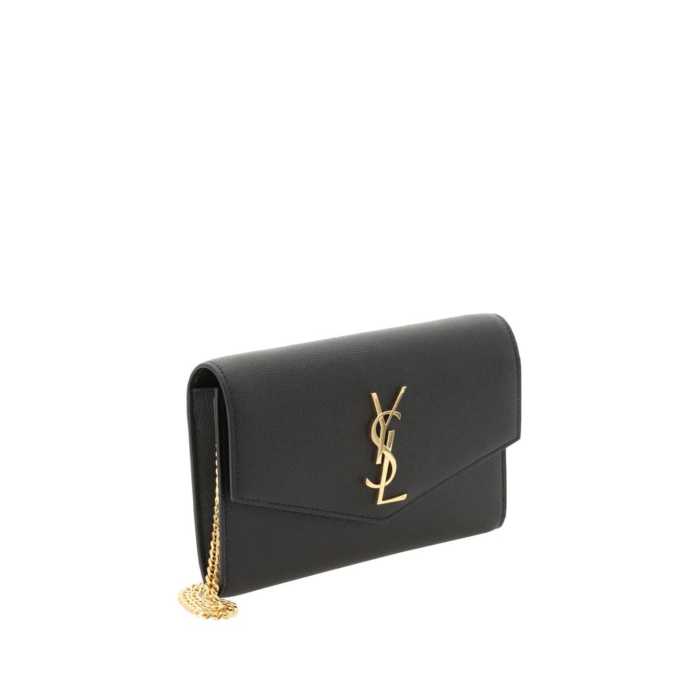 Compact Shoulder Clutch Bag by Saint Laurent for women in bos taurus calf leather black & gold features a distinguished silhouette, showcasing a secure magnetic & button and distinguished cardholder with versatile shoulder-strap for a distinguished finish.