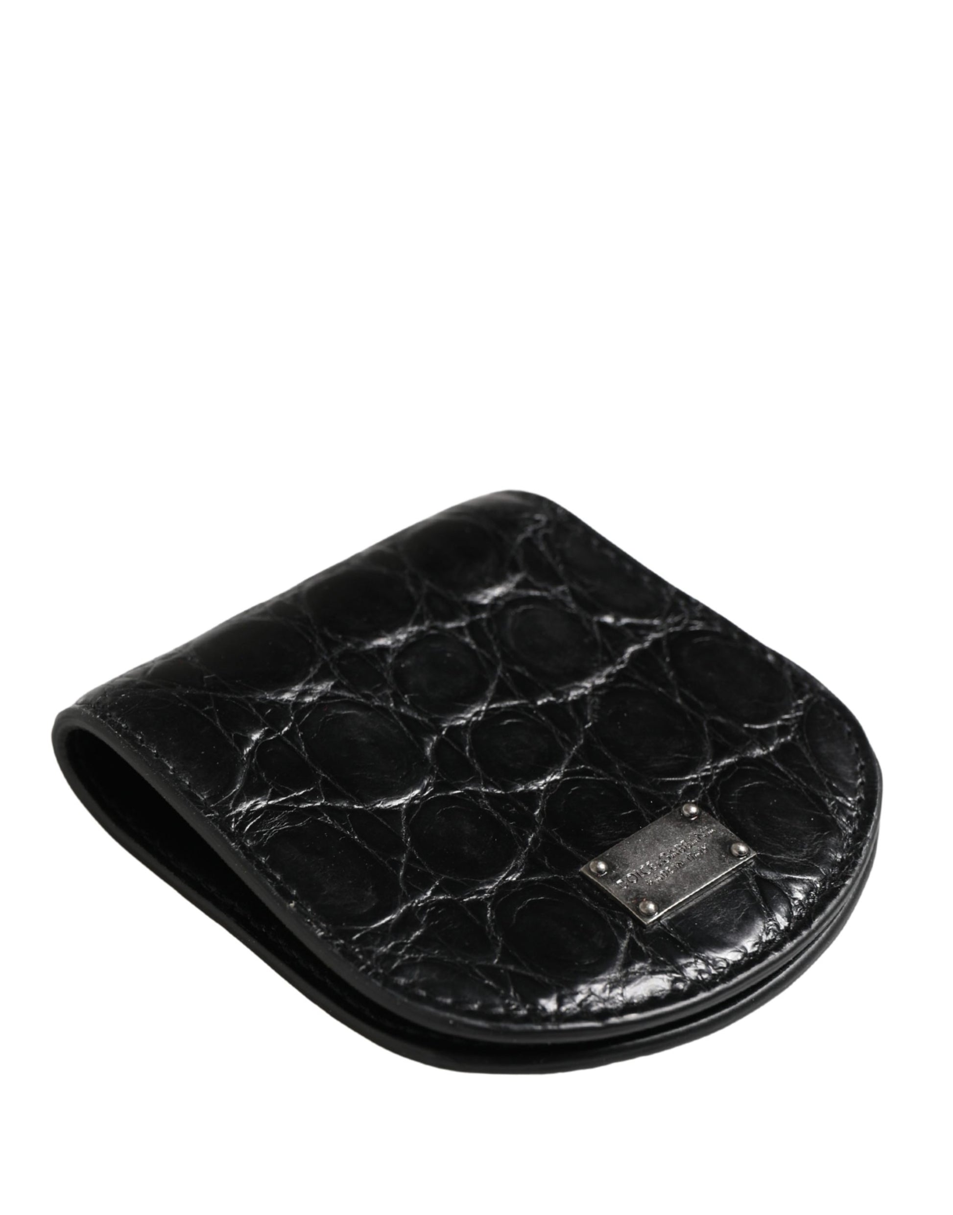Wallet by Dolce & Gabbana for men in exotic leather & viscose black showcases a discerning silhouette, artfully capturing the essence of Exotic Leather Viscose Wallet with its functional compact-design bifold.