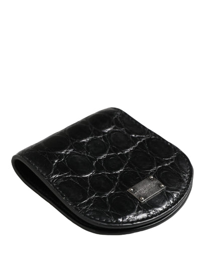 Wallet by Dolce & Gabbana for men in exotic leather & viscose black showcases a discerning silhouette, artfully capturing the essence of Exotic Leather Viscose Wallet with its functional compact-design bifold.