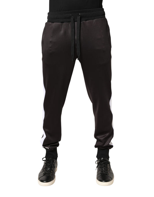 Joggers by Dolce & Gabbana for men in polyester brown & white features a polished silhouette with a polished skinny, athletic & regular-fit, reaching a polished long and finished with a polished mid rise.