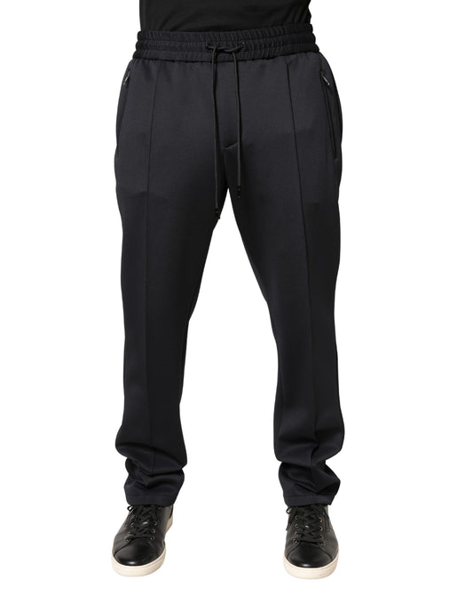 Joggers by Dolce & Gabbana for men in polyester black features an sartorial skinny, athletic & regular-fit and long with a mid rise cut for a sartorial finish.
