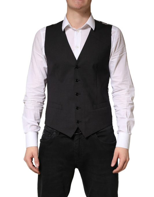 Vest by Dolce & Gabbana for men in viscose & virgin wool black showcases a utilitarian silhouette, artfully incorporating and a utilitarian for a truly utilitarian finish.
