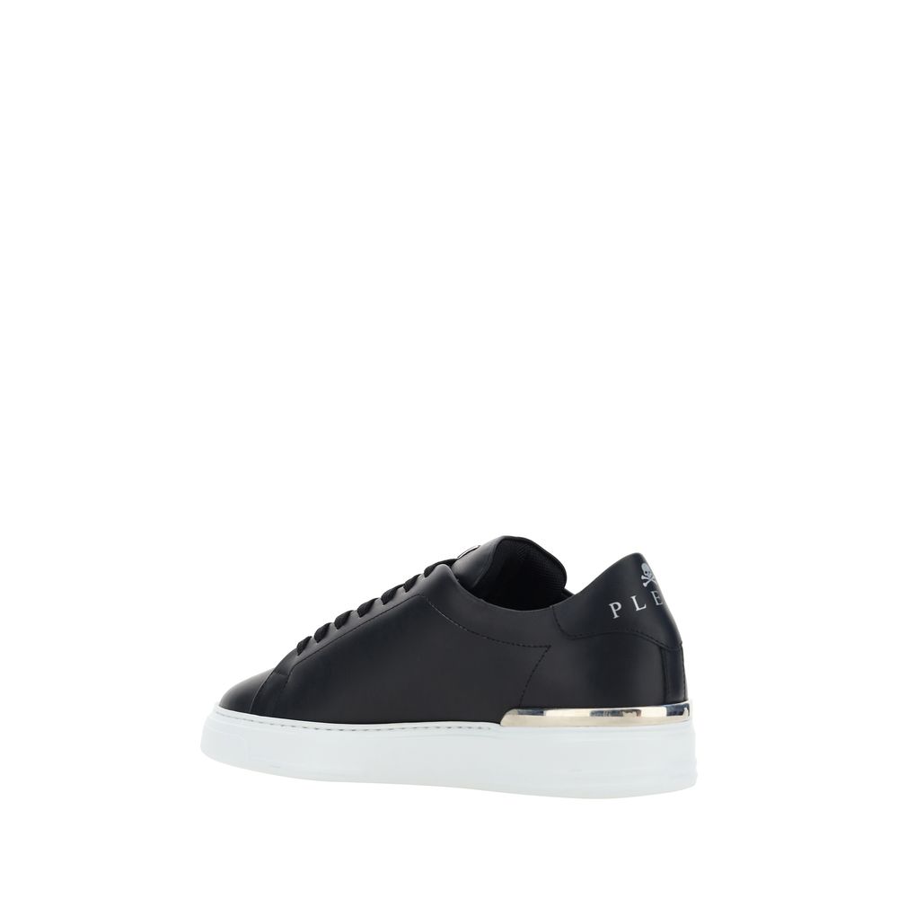 Sneakers by Philipp Plein for men in bos taurus calfskin leather black & monogram presents a on trend silhouette from the Men's Low Top Bos Taurus Calfskin Leather Sneakers collection, showcasing a on trend low-top style for an elevated aesthetic.