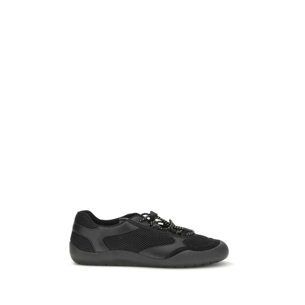 Athletic Sneakers by Prada for men in bos taurus calf leather & polyester black & patterned showcases a architectural silhouette, artfully capturing the essence of the Men's Athletic Bos Taurus Calf Leather & Polyester Sneakers with its signature architectural athletic style construction.