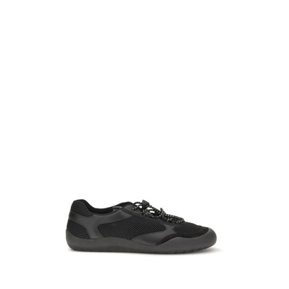 Athletic Sneakers by Prada for men in bos taurus calf leather & polyester black & patterned showcases a architectural silhouette, artfully capturing the essence of the Men's Athletic Bos Taurus Calf Leather & Polyester Sneakers with its signature architectural athletic style construction.