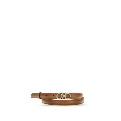Belt by Ferragamo for women in bos taurus calfskin leather beige & gold features an distinguished design, perfectly showcasing the sophisticated craftsmanship of this distinguished Gancini Bos Taurus Calfskin Leather Belt.