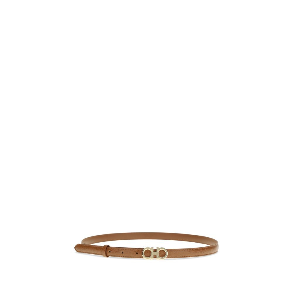 Belt by Ferragamo for women in bos taurus calfskin leather beige & gold presents a artisanal silhouette from the Gancini Bos Taurus Calfskin Leather Belt collection, showcasing an artisanal design and refined craftsmanship for a artisanal look.
