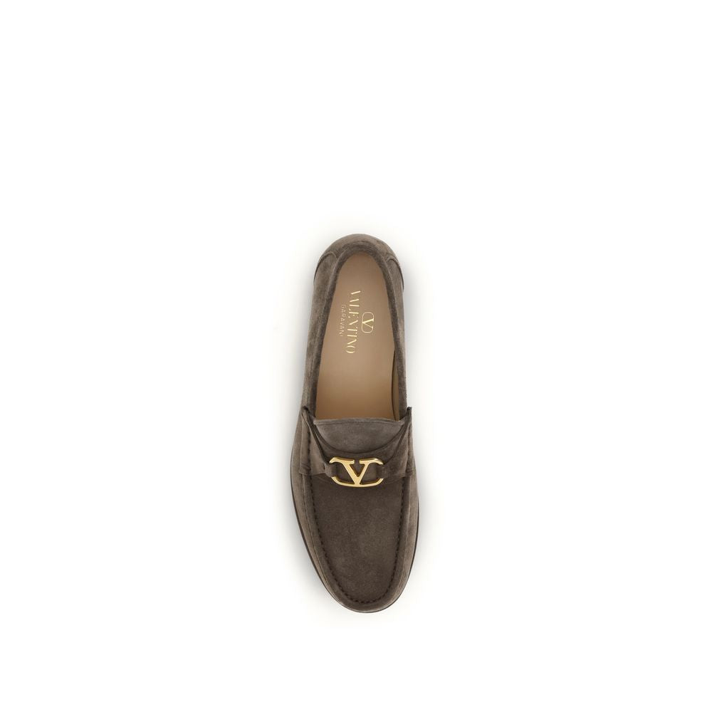 Loafer Slip-On Shoes by Valentino Garavani for men in bos taurus calf leather brown & signature showcases a timeless silhouette from the V Logo Men's Bos Taurus Calf Leather Loafer Slip-On Shoes collection, featuring a timeless and for a timeless finish.