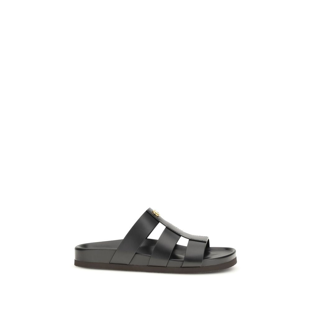 Slider Cage Sandals by Valentino Garavani for men in bos taurus calfskin leather and black & signature presents a captivating silhouette, showcasing the signature style of the V Logo Men's Bos Taurus Calfskin Leather Slider Cage Sandals with a captivating and captivating .