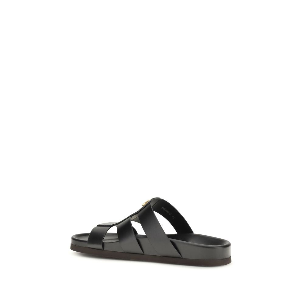 Slider Cage Sandals by Valentino Garavani for men in bos taurus calfskin leather and black & signature presents a captivating silhouette, showcasing the signature style of the V Logo Men's Bos Taurus Calfskin Leather Slider Cage Sandals with a captivating and captivating .
