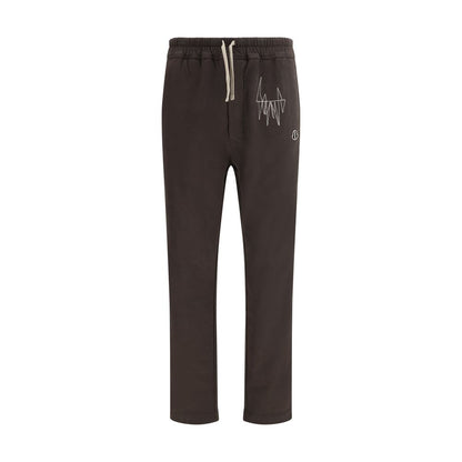 Sweatpants by Moncler x Rick Owens for men in cotton brown features an streamlined design with , highlighting a streamlined athletic & regular-fit and long cut with a comfortable .