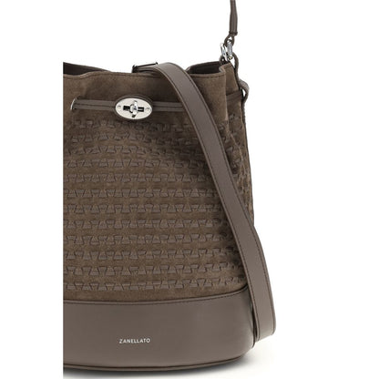 Shoulder Baguette Handbag by Zanellato for women in bos taurus calf suede leather brown presents a ornamental silhouette, showcasing a secure drawstring, ample , and versatile shoulder-strap, handle & adjustable-strap for a ornamental finish.