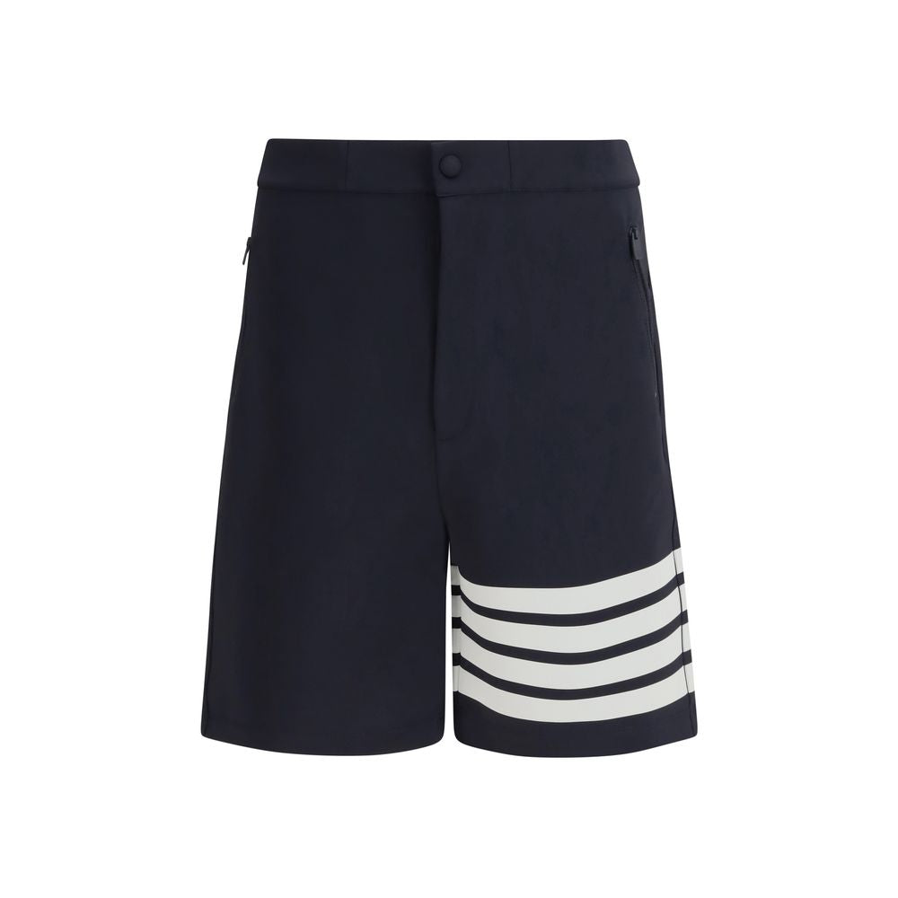 Bermuda Shorts by Thom Browne for men in stretch polyamide & viscose blue features an nuanced silhouette, showcasing a nuanced regular-fit with a short cut and for a sophisticated, premium finish.