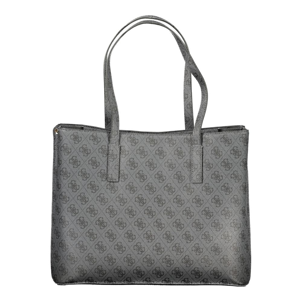 Handbag by Guess Jeans for women in polyurethane black & print features a ornamental silhouette, showcasing a secure snap & zipper, ample built-in-compartments & internal-pockets, and ornamental detachable-strap & handle for a sophisticated look.