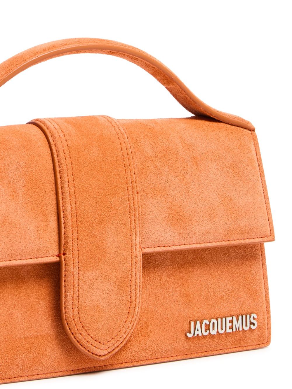 Small Crossbody Flap Handbag by Jacquemus for women in leather brown, gold & terracotta features a multifaceted silhouette, showcasing a secure flap & magnetic and multifaceted cardholder with versatile crossbody-strap, shoulder-strap, adjustable-strap & handle for multifaceted style.