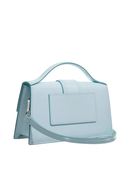Small Crossbody Flap Handbag by Jacquemus for women in leather blue, brown & silver features a transformative elegance silhouette, showcasing a secure flap & magnetic, organized cardholder, and versatile crossbody-strap, shoulder-strap, adjustable-strap & handle for a transformative elegance look.
