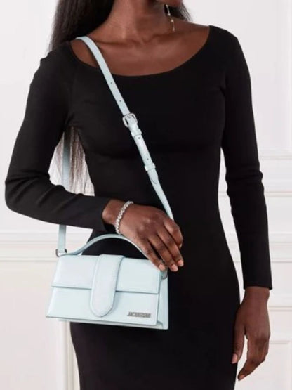 Small Crossbody Flap Handbag by Jacquemus for women in leather blue, brown & silver showcases a versatile sophistication silhouette, featuring a secure flap & magnetic, versatile sophistication cardholder, and versatile crossbody-strap, shoulder-strap, adjustable-strap & handle for a versatile sophistication finish.