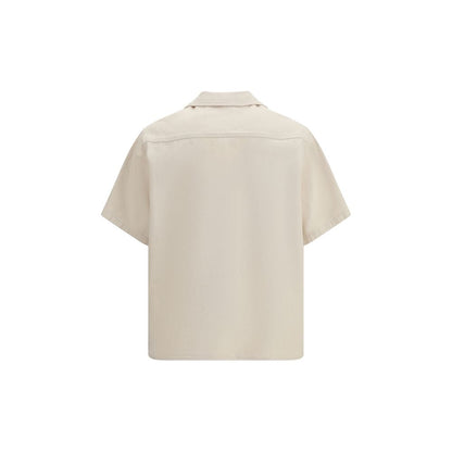 Shirt by Valentino Garavani for men in denim cotton beige, gold & signature showcases a sleek silhouette, elegantly detailed with a sleek and for a sleek finish.
